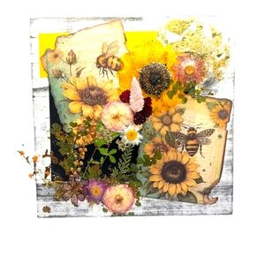 A sunflower lover's delight.  Mixed-media on a 10x10 slate wooden piece.
